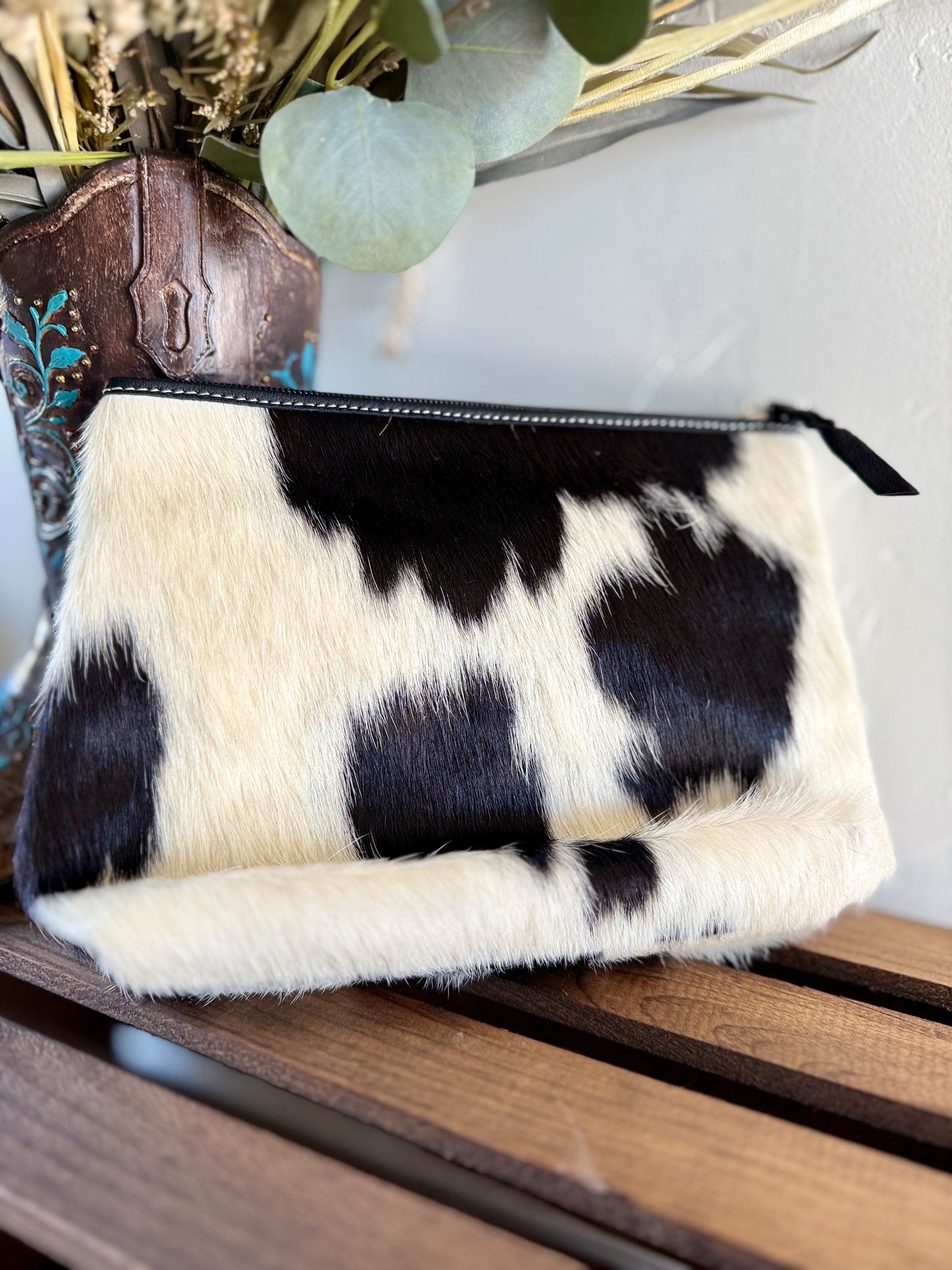 Black cowhide makeup bag