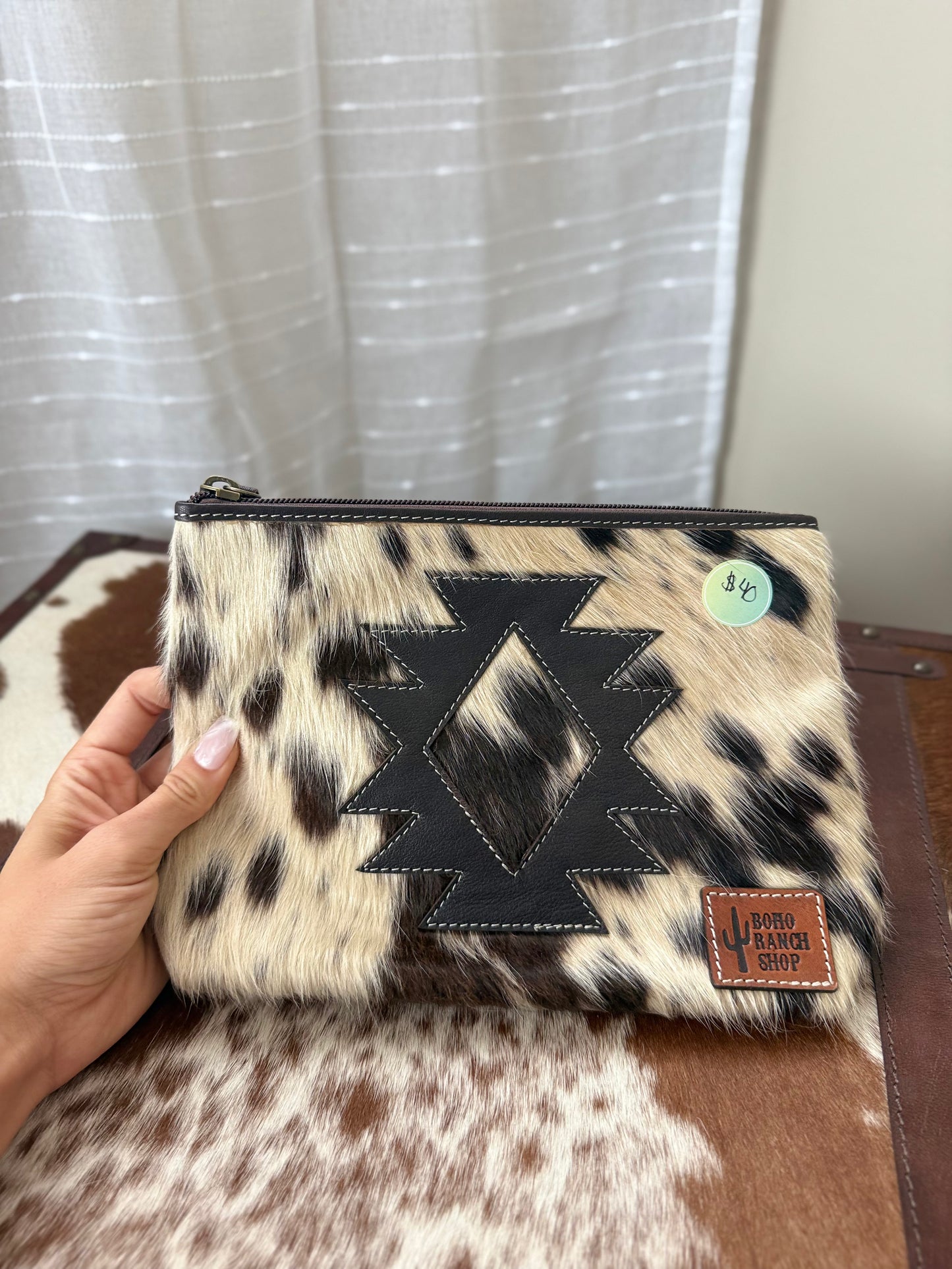 Brown cowhide makeup bag