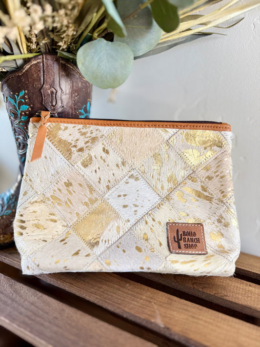 Gold cowhide makeup bag